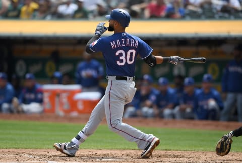 OAKLAND, CA – AUGUST 22: Nomar Mazara #30 of the Texas Rangers bats against the Oakland Athletics in the top of the third inning at Oakland Alameda Coliseum on August 22, 2018 in Oakland, California. (Photo by Thearon W. Henderson/Getty Images)