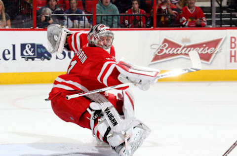 RALEIGH, NC – MARCH 23: Anton Khudobin #31 of the Carolina Hurricanes watches the puck as it goes wide of the net during an NHL game against the Chicago Blackhawks at PNC Arena on March 23, 2015 in Raleigh, North Carolina. (Photo by Gregg Forwerck/NHLI via Getty Images)