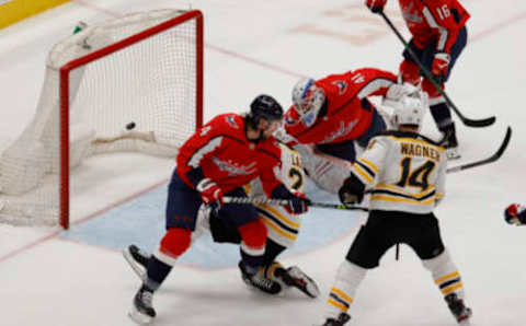 May 11, 2021; Washington, District of Columbia, USA; Boston Bruins center Curtis Lazar (20) scores a goal on Washington Capitals goaltender Vitek Vanecek (41) in the second period at Capital One Arena. Mandatory Credit: Geoff Burke-USA TODAY Sports