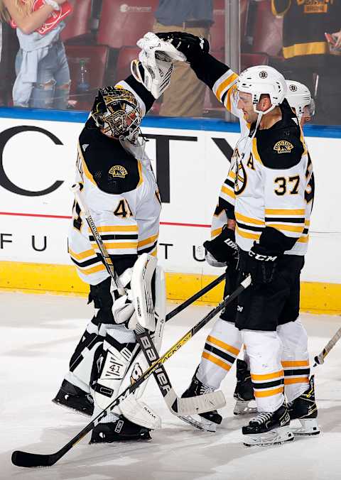 SUNRISE, FL – DECEMBER 14: Goaltender Jaroslav Halak #41 and Patrice Bergeron #37 of the Boston Bruins celebrates their 4-2 win against the Florida Panthers at the BB&T Center on December 14, 2019 in Sunrise, Florida. (Photo by Eliot J. Schechter/NHLI via Getty Images)