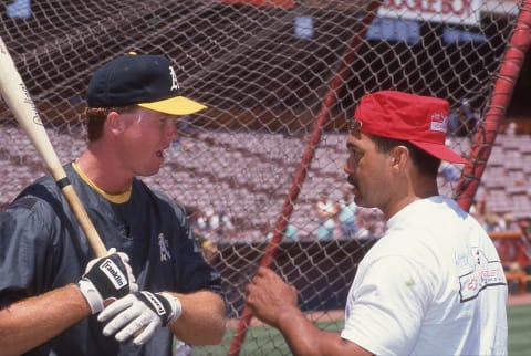 Mark McGwire with former Oakland Athletics star Reggie Jackson in the late 1980s. (Photo by Owen C. Shaw/Getty Images)