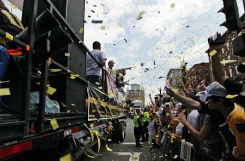 BOSTON – JUNE 18: Confetti flies over a joyful crowd Saturday during the Boston Bruins Stanley Cup parade in Boston. The parade began at the TD Garden and ended at Copley Square. (Photo by Jessey Dearing for The Boston Globe via Getty Images)