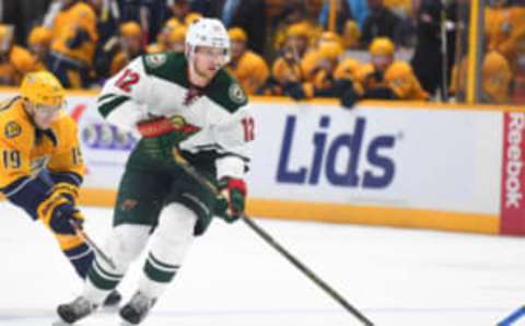 Dec 27, 2016; Nashville, TN, USA; Minnesota Wild center Eric Staal (12) skates with the puck in the overtime period against the Nashville Predators at Bridgestone Arena. Minnesota won 3-2 in overtime. Mandatory Credit: Christopher Hanewinckel-USA TODAY Sports