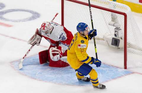 EDMONTON, AB – DECEMBER 26: Emil Heineman #13 of Sweden celebrates a goal against goaltender Nick Malik #30 of the Czech Republic during the 2021 IIHF World Junior Championship at Rogers Place on December 26, 2020 in Edmonton, Canada. (Photo by Codie McLachlan/Getty Images)