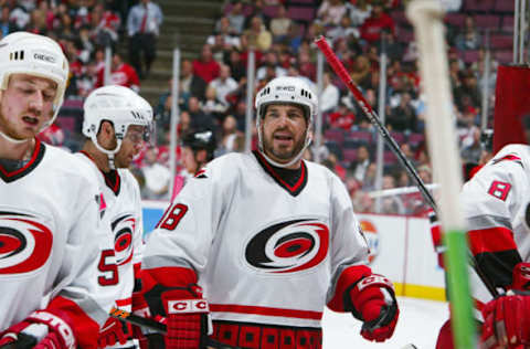 EAST RUTHERFORD, NJ – MAY 10: Mark Recchi #18 of the Carolina Hurricanes looks on against the New Jersey Devils in game three of the Eastern Conference Semifinals during the 2006 NHL Playoffs on May 10, 2006 at Continental Airlines Arena in East Rutherford, New Jersey. The Hurricanes won 3-2. (Photo by Jim McIsaac/Getty Images)