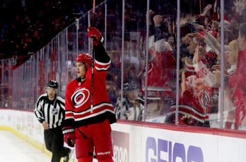 RALEIGH, NC – NOVEMBER 21: Sebastian Aho #20 of the Carolina Hurricanes scores an empty net goal that seals a victory over the Toronto Maple Leafs during an NHL game on November 21, 2018, at PNC Arena in Raleigh, North Carolina. (Photo by Gregg Forwerck/NHLI via Getty Images)