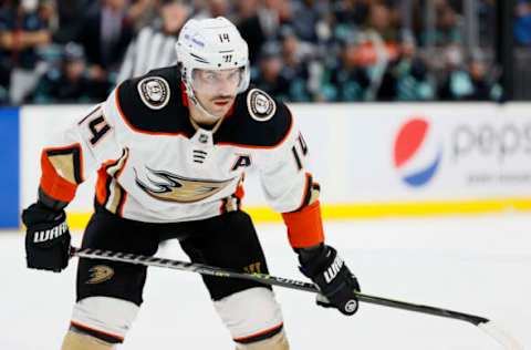 SEATTLE, WASHINGTON – NOVEMBER 11: Adam Henrique #14 of the Anaheim Ducks looks on against the Seattle Kraken during the first period on November 11, 2021 at Climate Pledge Arena in Seattle, Washington. (Photo by Steph Chambers/Getty Images)