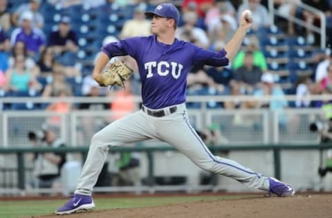 Jun 19, 2015; Omaha, NE, USA; TCU Horned Frogs pitcher Tyler Alexander (13) pitches against the LSU Tigers in the 2015 College World Series at TD Ameritrade Park. Mandatory Credit: Steven Branscombe-USA TODAY Sports