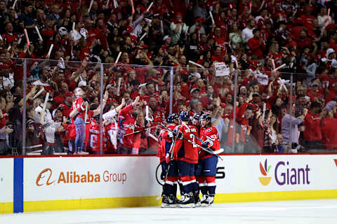 WASHINGTON, DC – APRIL 13: T.J. Oshie #77 of the Washington Capitals celebrates with teammates after scoring a first period goal against the Carolina Hurricanes in Game Two of the Eastern Conference First Round during the 2019 NHL Stanley Cup Playoffs at Capital One Arena on April 13, 2019 in Washington, DC. (Photo by Rob Carr/Getty Images)