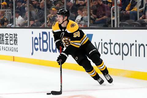 BOSTON, MA – SEPTEMBER 23: Boston Bruins defenseman Urho Vaakanainen (58) starts up ice during a preseason game between the Boston Bruins and the Philadelphia Flyers on September 23, 2109, at TD Garden in Boston, Massachusetts. (Photo by Fred Kfoury III/Icon Sportswire via Getty Images)