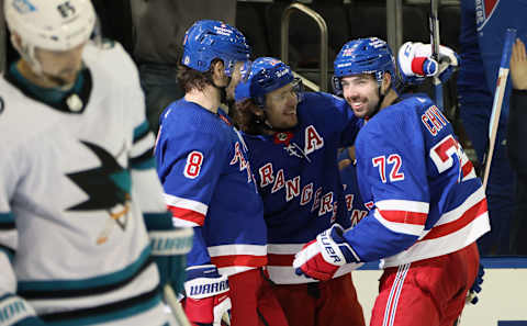 NEW YORK, NEW YORK – OCTOBER 20: Filip Chytil #72 of the New York Rangers celebrates his goal at 1:50 of the second period against the San Jose Sharks and is joined by Jacob Trouba #8 (L) and Artemi Panarin #10 (C) at Madison Square Garden on October 20, 2022, in New York City. (Photo by Bruce Bennett/Getty Images)