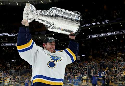 BOSTON, MASSACHUSETTS – JUNE 12: Jordan Binnington #50 of the St. Louis Blues hoists the Stanley Cup on the ice after the 2019 NHL Stanley Cup Final at TD Garden on June 12, 2019 in Boston, Massachusetts. The St. Louis Blues defeated the Boston Bruins 4-1 in Game 7 to win the Stanley Cup Final 4-3. (Photo by Dave Sandford/NHLI via Getty Images)