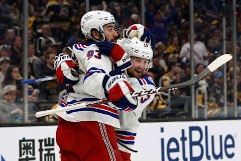 Apr 23, 2022; Boston, Massachusetts, USA; New York Rangers center Mika Zibanejad (93) celebrates his goal against the Boston Bruins with left wing Alexis Lafrenière (13) during the third period at TD Garden. Mandatory Credit: Winslow Townson-USA TODAY Sports