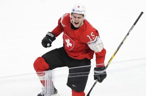 COPENHAGEN, DENMARK – MAY 19, 2018: Switzerlands Gregory Hofmann scores against Canada in their 2018 IIHF World Championship semi-final match at Royal Arena in Copenhagen. Anton Novoderezhkin/TASS (Photo by Anton NovoderezhkinTASS via Getty Images)