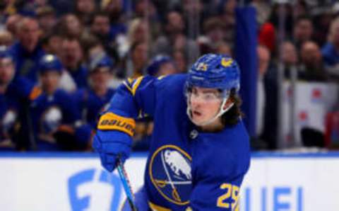 Apr 8, 2023; Buffalo, New York, USA; Buffalo Sabres defenseman Owen Power (25) takes a shot on goal during the second period against the Carolina Hurricanes at KeyBank Center. Mandatory Credit: Timothy T. Ludwig-USA TODAY Sports