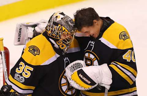 BOSTON – OCTOBER 26: Boston Bruins’ goalie Anton Khudobin, left, is congratulated by goalie Tuuka Rask at the end of the game in which the Bruins won, 2-1. The Boston Bruins host the San Jose Sharks in a regular season NHL hockey game at TD Garden in Boston on Oct. 26, 2017. (Photo by John Tlumacki/The Boston Globe via Getty Images)