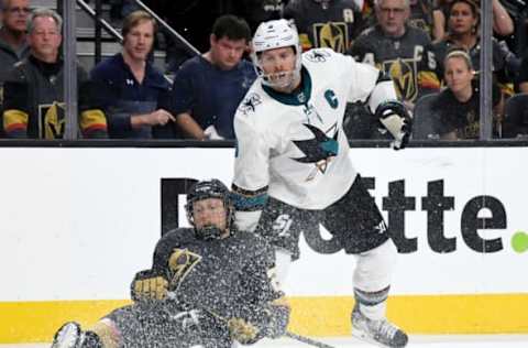 LAS VEGAS, NEVADA – APRIL 21: Cody Eakin #21 of the Vegas Golden Knights and Joe Pavelski #8 of the San Jose Sharks collide as they go after the puck in the first overtime period of Game Six of the Western Conference First Round during the 2019 NHL Stanley Cup Playoffs at T-Mobile Arena on April 21, 2019 in Las Vegas, Nevada. The Sharks defeated the Golden Knights 2-1 in double overtime to even the series at 3-3. (Photo by Ethan Miller/Getty Images)