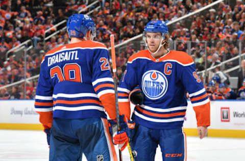 EDMONTON, AB – DECEMBER 9: Connor McDavid #97 and Leon Draisaitl #29 of the Edmonton Oilers discuss the play during the game against the Calgary Flames on December 9, 2018 at Rogers Place in Edmonton, Alberta, Canada. (Photo by Andy Devlin/NHLI via Getty Images)