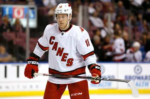 SUNRISE, FLORIDA – OCTOBER 08: Ryan Dzingel #18 of the Carolina Hurricanes looks on against the Florida Panthers during the second period at BB&T Center on October 08, 2019 in Sunrise, Florida. (Photo by Michael Reaves/Getty Images)