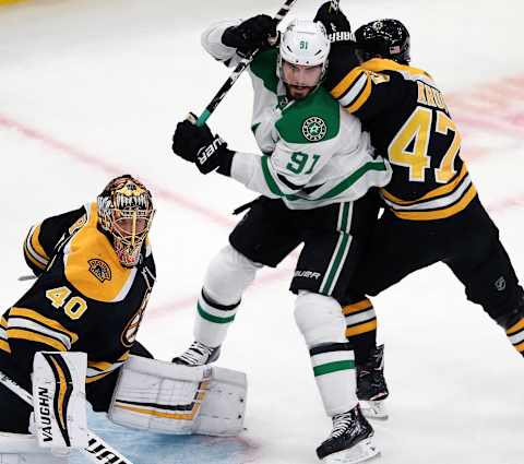 BOSTON – NOVEMBER 5: Boston Bruins’ Torey Krug battles the Stars’ Tyler Seguin in front of Boston goalie Tuukka Rask during the first period. The Boston Bruins host the Dallas Stars in a regular season NHL hockey game at TD Garden in Boston on Nov. 5, 2018. (Photo by Jim Davis/The Boston Globe via Getty Images)