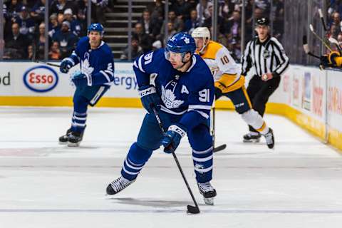 TORONTO, ON – JANUARY 7: John Tavares #91 of the Toronto Maple Leafs skates with the puck against the Nashville Predators during the second period at the Scotiabank Arena on January 7, 2019 in Toronto, Ontario, Canada. (Photo by Kevin Sousa/NHLI via Getty Images)