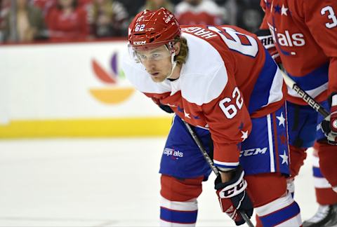 WASHINGTON, DC – APRIL 06: Washington Capitals left wing Carl Hagelin (62) intensely waits for a face-off during the New York Islanders vs. the Washington Capitals NHL game April 6, 2019 at Capital One Arena in Washington, D.C.. (Photo by Randy Litzinger/Icon Sportswire via Getty Images)