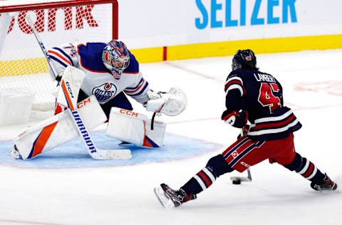 Winnipeg Jets, Brad Lambert (47) Edmonton Oilers, Stuart Skinner (74). Mandatory Credit: James Carey Lauder-USA TODAY Sports