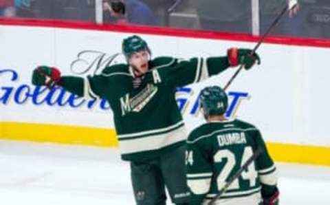 Oct 29, 2016; Saint Paul, MN, USA; Minnesota Wild forward Eric Staal (12) celebrates his goal in the third period against the Dallas Stars at Xcel Energy Center. The Minnesota Wild beat the Dallas Stars 4-0. Mandatory Credit: Brad Rempel-USA TODAY Sports