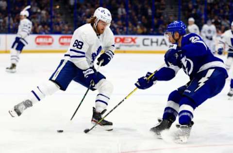 TAMPA, FLORIDA – FEBRUARY 25: William Nylander #88 of the Toronto Maple Leafs and Kevin Shattenkirk #22 of the Tampa Bay Lightning fight for the puck during a game at Amalie Arena on February 25, 2020 in Tampa, Florida. (Photo by Mike Ehrmann/Getty Images)