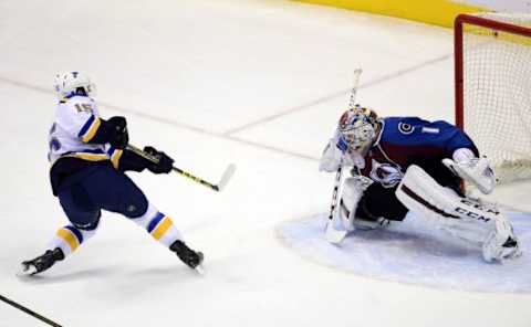 Jan 22, 2016; Denver, CO, USA; St. Louis Blues center Robby Fabbri (15) attempts to score past Colorado Avalanche goalie Semyon Varlamov (1) in the first period at Pepsi Center. Mandatory Credit: Ron Chenoy-USA TODAY Sports