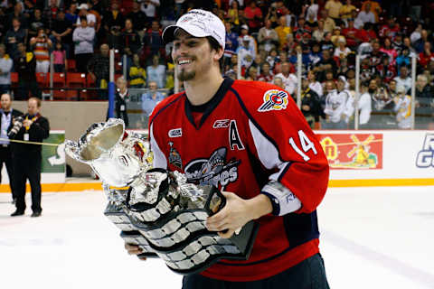 BRANDON, CANADA – MAY 23: Adam Henrique #14 of the Windsor Spitfires skates with the Memorial Cup after defeating the Brandon Wheat Kings in the Final of the 2010 Mastercard Memorial Cup Tournament at the Keystone Centre on May 1, 2010, in Brandon, Manitoba, Canada. (Photo by Richard Wolowicz/Getty Images)