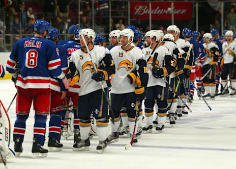 NEW YORK – MAY 6: Marek Malik #8 of the New York Rangers congratulates Toni Lydman #5 of the Buffalo Sabres after loosing Game Six of the 2007 Eastern Conference Semifinals 5-4 on May 6, 2007 at Madison Square Garden in New York City. (Photo by Bruce Bennett/Getty Images)