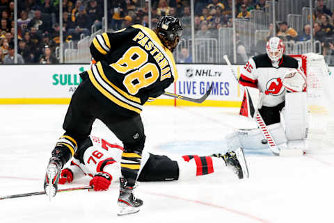 BOSTON, MA – OCTOBER 12: Boston Bruins right wing David Pastrnak (88) beats the slide from New Jersey Devils defenseman P.K. Subban (76) and puts a shot on New Jersey Devils goalie Cory Schneider (35) during a game between the Boston Bruins and the New Jersey Devils on October 12, 2019, at TD Garden in Boston, Massachusetts. (Photo by Fred Kfoury III/Icon Sportswire via Getty Images)