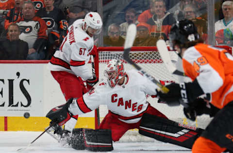 PHILADELPHIA, PA – NOVEMBER 05: Petr Mrazek #34 of the Carolina Hurricanes stops a shot on goal by the Philadelphia Flyers with Trevor van Riemsdyk #57 on November 5, 2019 at the Wells Fargo Center in Philadelphia, Pennsylvania. (Photo by Len Redkoles/NHLI via Getty Images)