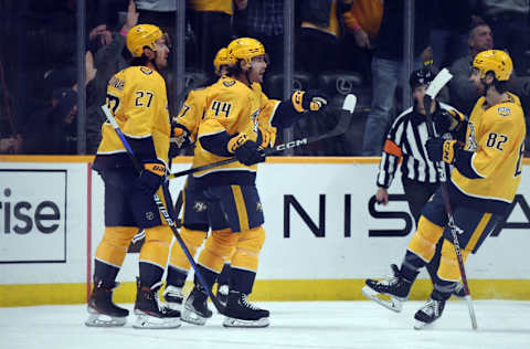 Oct 24, 2023; Nashville, Tennessee, USA; Nashville Predators left wing Kiefer Sherwood (44) celebrates with teammates after a goal during the second period against the Vancouver Canucks at Bridgestone Arena. Mandatory Credit: Christopher Hanewinckel-USA TODAY Sports