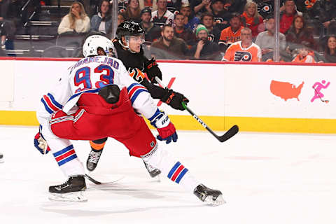 Nicolas Aube-Kubel #62 of the Philadelphia Flyers shoots the puck and scores his first career NHL goal