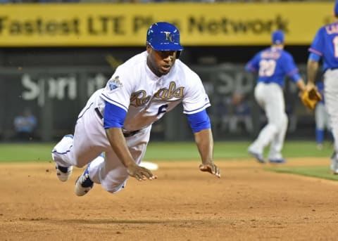 Apr 3, 2016; Kansas City, MO, USA; Kansas City Royals center fielder Lorenzo Cain (6) dives into third base, after a single from Eric Hosmer against the New York Mets during the fourth inning at Kauffman Stadium. Mandatory Credit: Peter G. Aiken-USA TODAY Sports