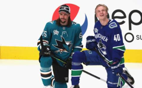 SAN JOSE, CA – JANUARY 25: Erik Karlsson #65 of the San Jose Sharks and Elias Pettersson #40 of the Vancouver Canucks look on during warm-up prior to the 2019 SAP NHL All-Star Skills at SAP Center on January 25, 2019 in San Jose, California. (Photo by Chase Agnello-Dean/NHLI via Getty Images)