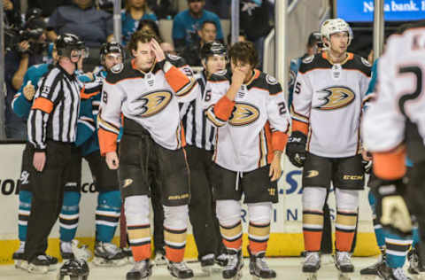 SAN JOSE, CA – APRIL 16: Anaheim Ducks players Anaheim Ducks defenseman Brandon Montour (26) and Anaheim Ducks center Derek Grant (38) come away from a scuffle with some minor bruises during the Stanley Cup Playoff game between the Anaheim Ducks versus the San Jose Sharks on Monday, April 16, 2018 at the SAP Center in San Jose, CA (Photo by Douglas Stringer/Icon Sportswire via Getty Images)