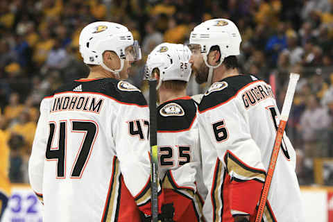 NASHVILLE, TN – JANUARY 16: Anaheim Ducks left wing Adam Henrique (14), defenseman Erik Gudbranson (6) and right wing Ondrej Kase (25) talk during the NHL game between the Nashville Predators and Anaheim Ducks, held on January 16, 2020, at Bridgestone Arena in Nashville, Tennessee. (Photo by Danny Murphy/Icon Sportswire via Getty Images)