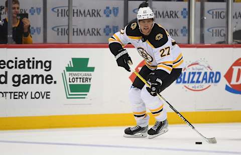 PITTSBURGH, PA – NOVEMBER 01: Hampus Lindholm #27 of the Boston Bruins skates with the puck in the overtime period during the game against the Pittsburgh Penguins at PPG PAINTS Arena on November 1, 2022, in Pittsburgh, Pennsylvania. (Photo by Justin Berl/Getty Images)