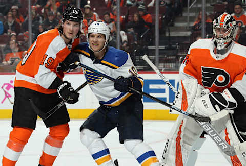 PHILADELPHIA, PA – JANUARY 07: Brayden Schenn #10 of the St Louis Blues battles against Nolan Patrick #19 the Philadelphia Flyers alongside goaltender Carter Hart #79 on January 7, 2019, at the Wells Fargo Center in Philadelphia, Pennsylvania. (Photo by Len Redkoles/NHLI via Getty Images)