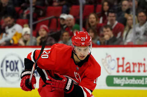 RALEIGH, NC – FEBRUARY 2: Sebastian Aho #20 of the Carolina Hurricanes skates for position on the ice during an NHL game against the Vancouver Canucks on February 2, 2020 at PNC Arena in Raleigh, North Carolina. (Photo by Gregg Forwerck/NHLI via Getty Images)