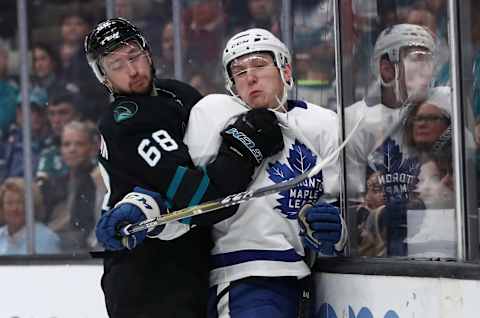 SAN JOSE, CA – NOVEMBER 15: Melker Karlsson #68 of the San Jose Sharks checks Travis Dermott #23 of the Toronto Maple Leafs at SAP Center on November 15, 2018 in San Jose, California. (Photo by Ezra Shaw/Getty Images)