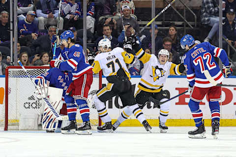 May 3, 2022; New York, New York, USA; Pittsburgh Penguins center Evgeni Malkin (71) reacts with left wing Brock McGinn (23) after scoring a goal past New York Rangers goaltender Igor Shesterkin (31) during the third overtime in game one of the first round of the 2022 Stanley Cup Playoffs at Madison Square Garden. Mandatory Credit: Vincent Carchietta-USA TODAY Sports