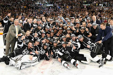 LOS ANGELES, CA – JUNE 11: The Los Angeles Kings pose together with the Stanley Cup in a group photo after defeating the New Jersey Devils in Game Six of the 2012 Stanley Cup Finals at Staples Center on June 11, 2012 in Los Angeles, California. The Kings defeated the Devils 6-1 to win the series 4 games to 2. (Photo by Christian Petersen/Getty Images)