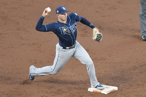 BALTIMORE, MD – JULY 28: Daniel Robertson #28 of the Tampa Bay Rays fields a ground ball during a baseball game against the Baltimore Orioles at Oriole Park at Camden Yards on July 28, 2018 in Baltimore, Maryland. (Photo by Mitchell Layton/Getty Images)