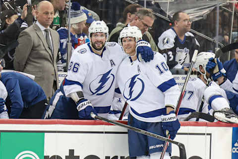 Mar 14, 2023; Newark, New Jersey, USA; Tampa Bay Lightning right wing Nikita Kucherov (86) and right wing Corey Perry (10) look on during the third period against the New Jersey Devils at Prudential Center. Mandatory Credit: Vincent Carchietta-USA TODAY Sports