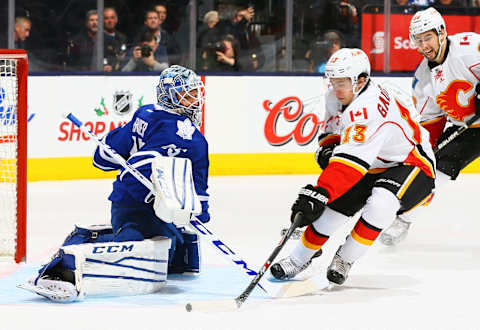 TORONTO, ON – DECEMBER 9: Jonathan Bernier #45 of the Toronto Maple Leafs stops Johnny Gaudreau (Photo by Abelimages/Getty Images)