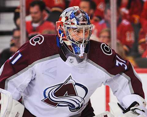 CALGARY, AB – APRIL 11: Philipp Grubauer #31 of the Colorado Avalanche in action against the Calgary Flames in Game One of the Western Conference First Round during the 2019 NHL Stanley Cup Playoffs at Scotiabank Saddledome on March 15, 2019 in Calgary, Alberta, Canada. (Photo by Derek Leung/Getty Images)